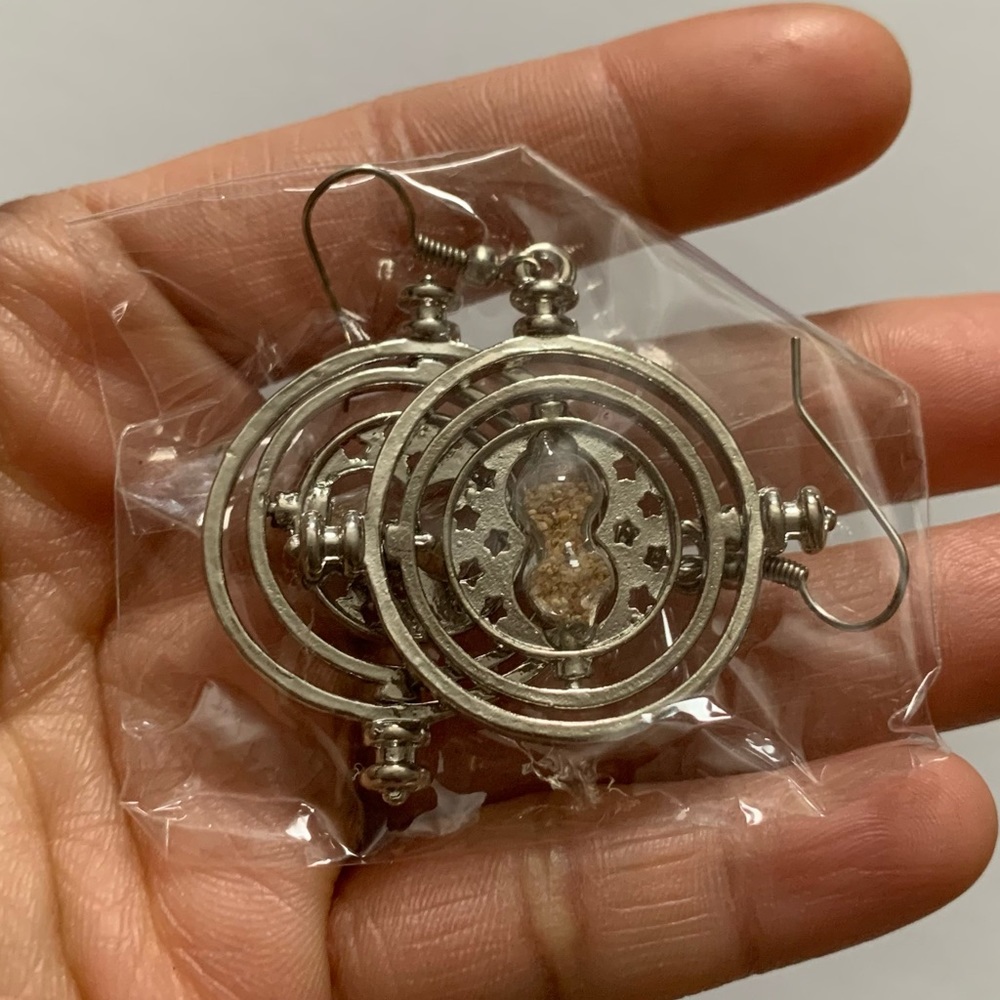 NWOT Harry Potter Time Turner Swiveling Hourglass Rotating Time Earrings Silver